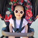 Baby wearing Teeny Baby Polarized Floral Sunglasses with Strap - Pink