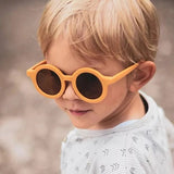 Toddler Wearing Teeny Mustard Baby Sunglasses UV400