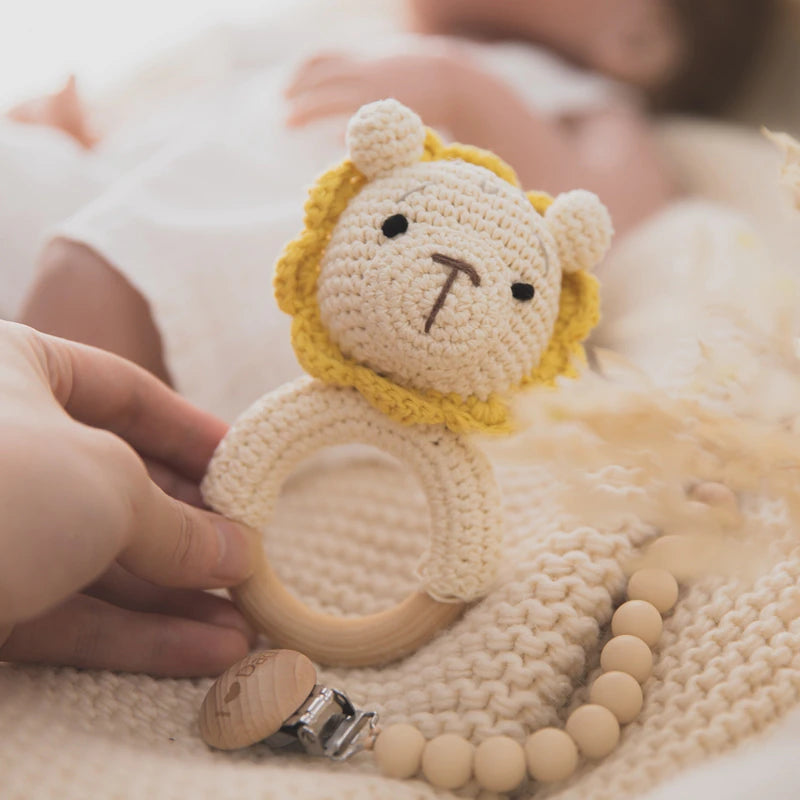 Hand Holding Baby Handmade Crochet Wooden Ring Rattle Toy - Lion