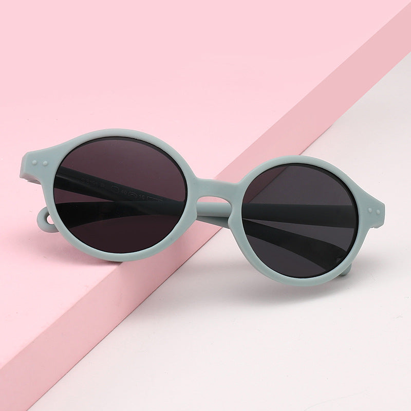 Blue Teeny Baby Round Polarized Sunglasses Pink Background