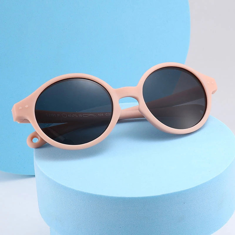 Pink Teeny Baby Round Polarized Sunglasses Blue Background